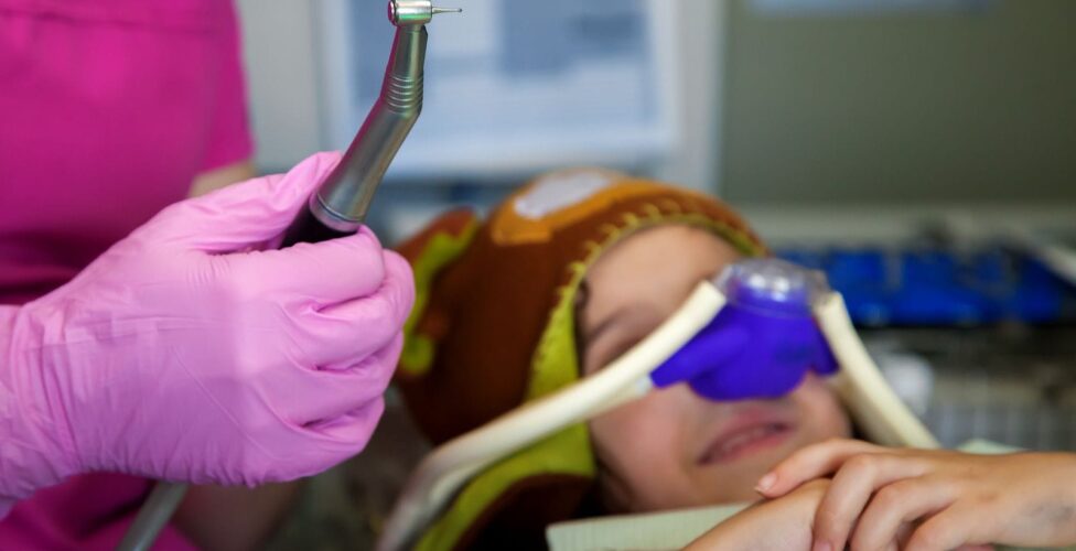 Someone with dental anxiety receiving sedation for their treatment.